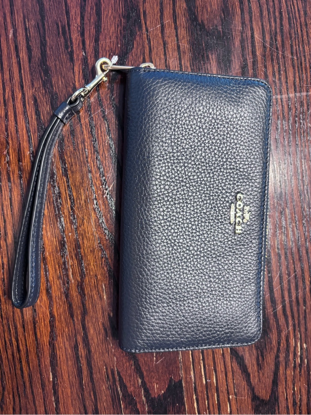 COACH Navy Pebbled Leather Wristlet Phone Case with Gold Hardware